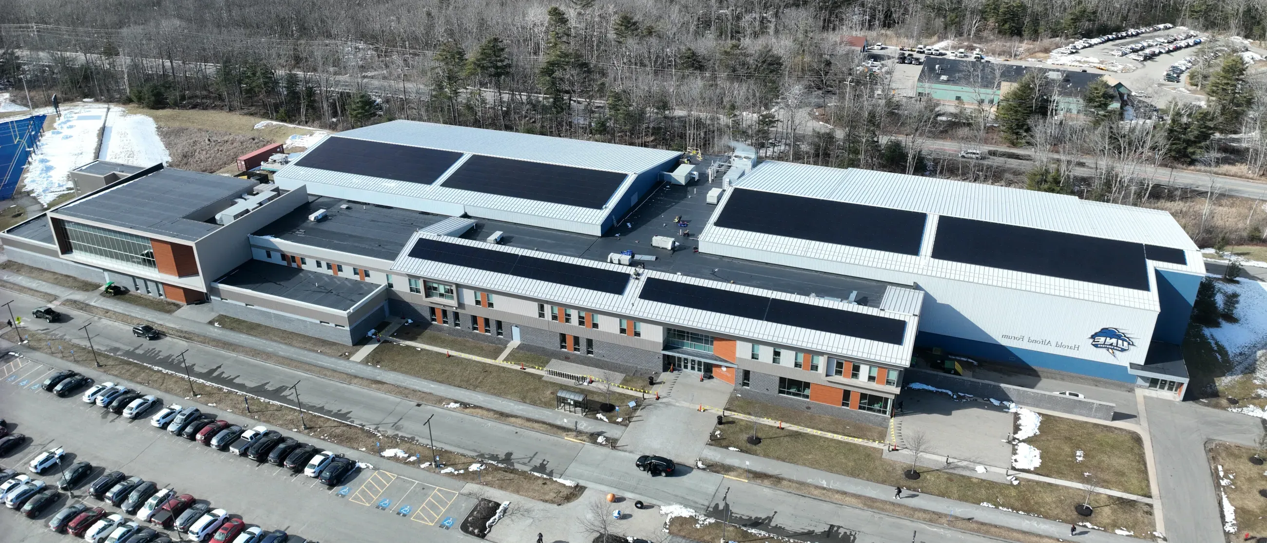 Aerial image of solar panels atop the Harold Alfond Forum